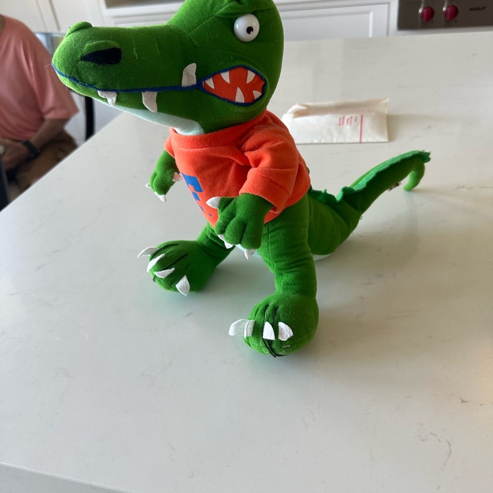 Playful Green and Orange UF Dinosaur Plush